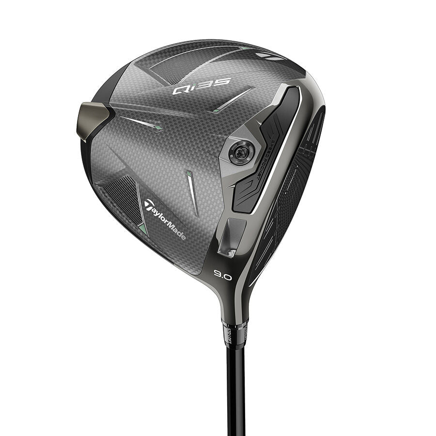 Sole of a TaylorMade Qi35 driver showing the TAS weight port